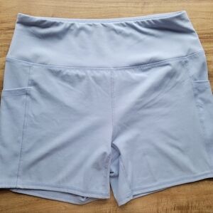 Size large, light blue RBX gym shorts with two side pockets